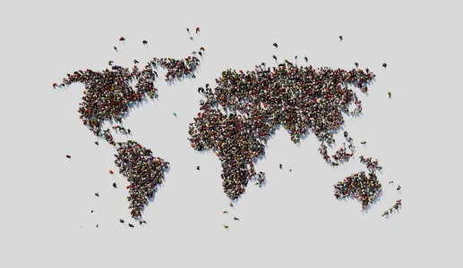 Imagem de muitas pessoas juntas a dar forma ao mapa do mundo
