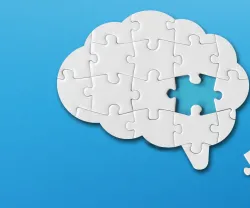 Imagem de um puzzle com a forma de um cérebro onde uma das peças está por preencher